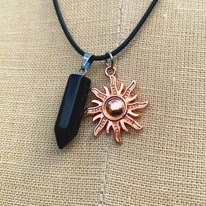 Handmade Dagger Stone Amulet with Sun Charm